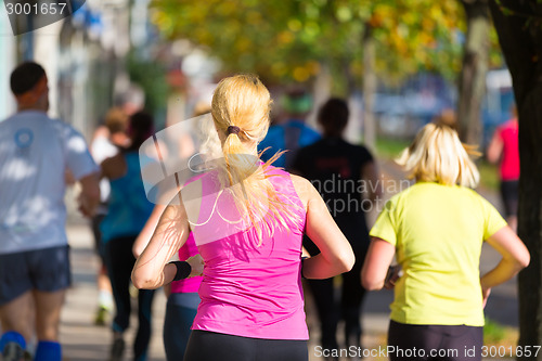 Image of Group of people running.