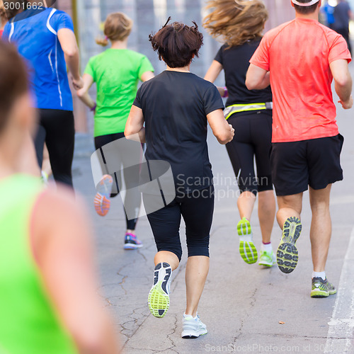 Image of Group of people running.