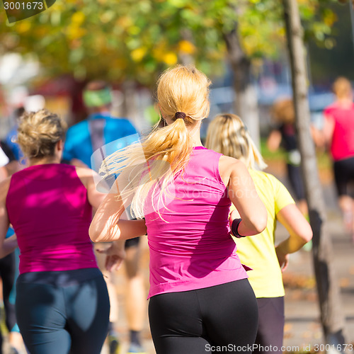 Image of Group of people running.