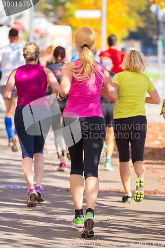 Image of Group of people running.