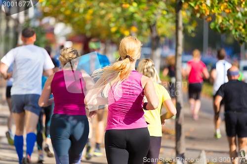 Image of Group of people running.