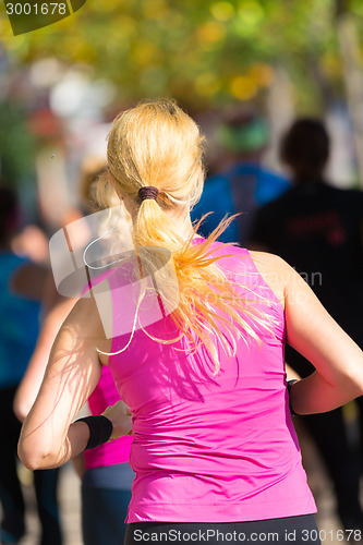 Image of Group of people running.