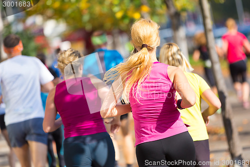 Image of Group of people running.