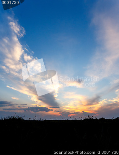 Image of African sunset with dramatic clouds on sky