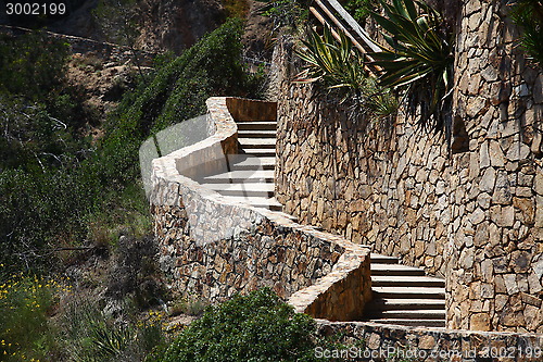 Image of winding stone staircase in the mountains