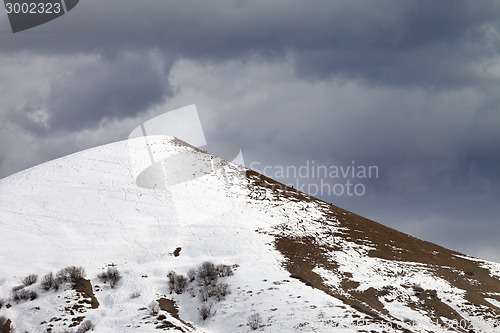 Image of Off piste slope and overcast gray sky