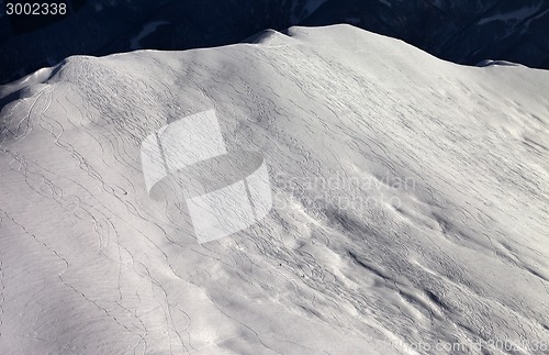 Image of View on off-piste slope at sunny evening