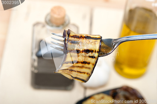 Image of grilled eggplant oubergine on a fork