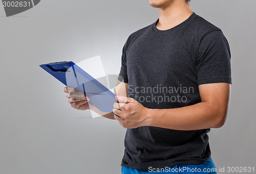 Image of Man hold with clipboard