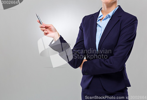 Image of Businesswoman with pen point up