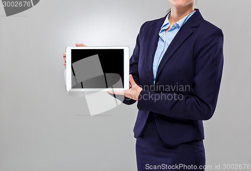 Image of Businesswoman show the blank screen of digital tablet