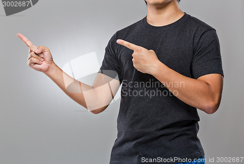 Image of Man with two finger point aside