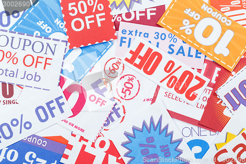 Image of Colorful clipped multi valued grocery coupons 