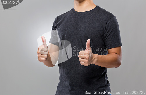 Image of Man with thumb up