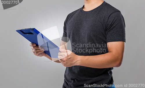 Image of Man hold with clipboard