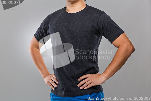 Image of Man with hands on hip