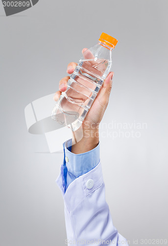 Image of Doctor hold with water bottle