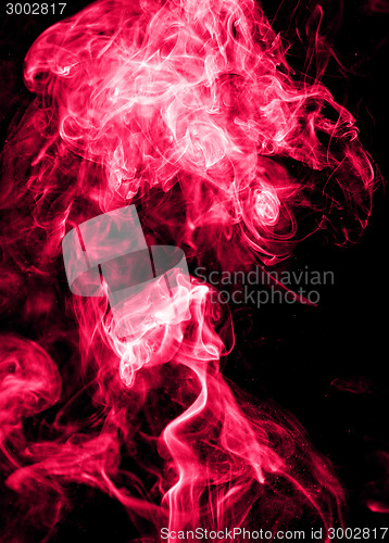 Image of Red smoke on a black background