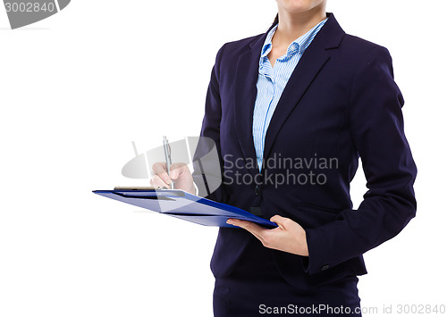 Image of Businesswoman take note on clipboard