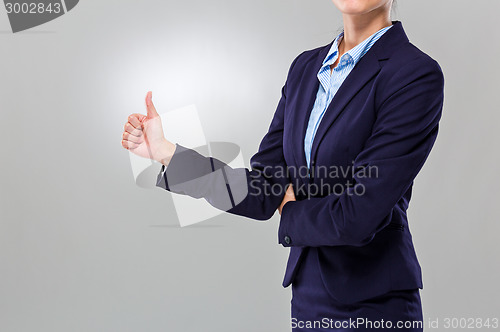 Image of Businesswoman with thumb up