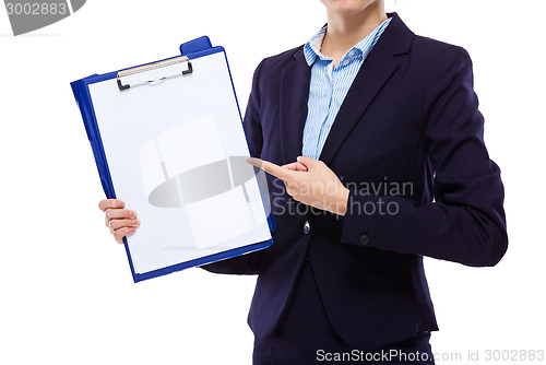 Image of Businesswoman finger point to blank paper of clipboard
