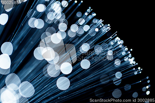 Image of Fiber optic emitting blue light