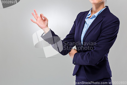 Image of Businesswoman hand with ok sign