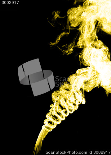 Image of Yellow smoke on black