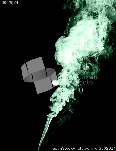 Image of Green smoke on black