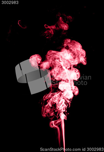 Image of Red smoke isolated on black 