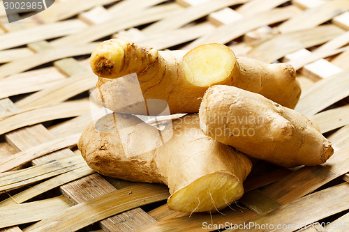 Image of Ginger on the bamboo mat