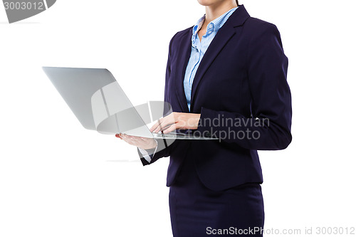 Image of Businesswoman use of laptop computer