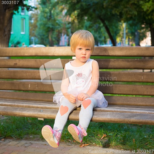 Image of Outdoor portrait  of cute little girl