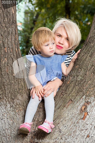 Image of Young mother and her toddler girl