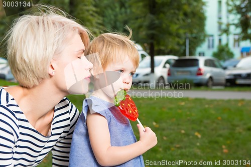 Image of Young mother and her toddler girl