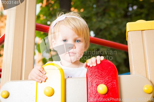 Image of Outdoor portrait  of cute little girl