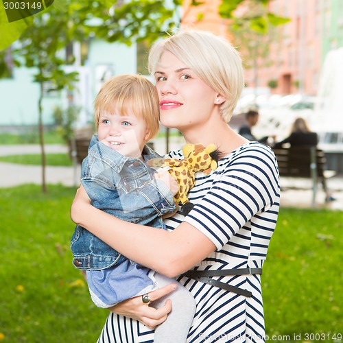 Image of Young mother and her toddler girl