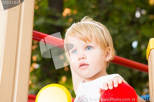 Image of Outdoor portrait  of cute little girl