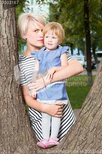 Image of Young mother and her toddler girl