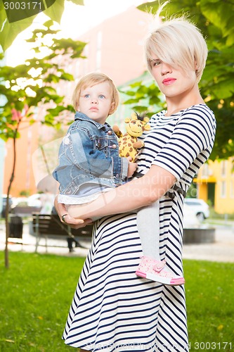 Image of Young mother and her toddler girl
