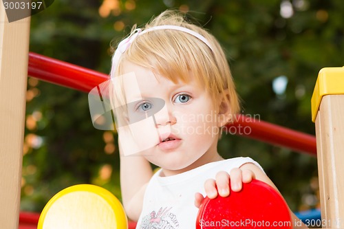 Image of Outdoor portrait  of cute little girl