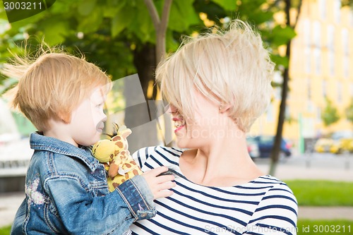 Image of Young mother and her toddler girl