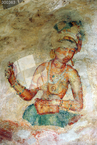 Image of Girl on the wall of rock