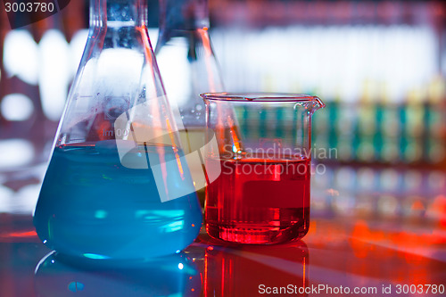 Image of Backlit laboratory flask.