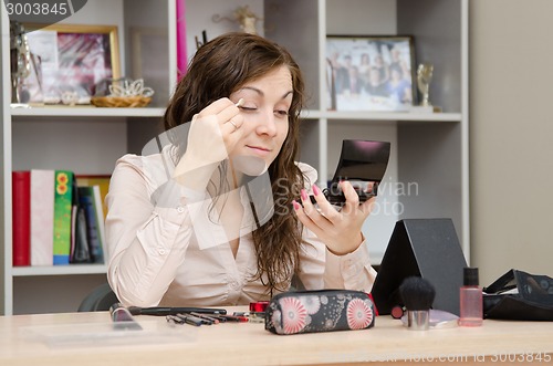 Image of girl at work paints shadows forever