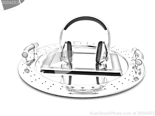 Image of Phone and headphones on metal tray 