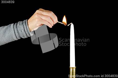 Image of Lighting a candle