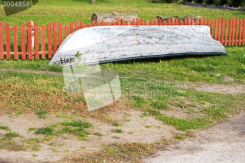 Image of old boat on the grass