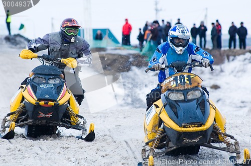 Image of Racing of snowmobiles