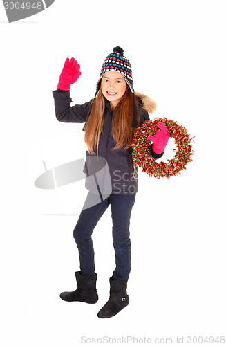 Image of Girl with wreath waiving.
